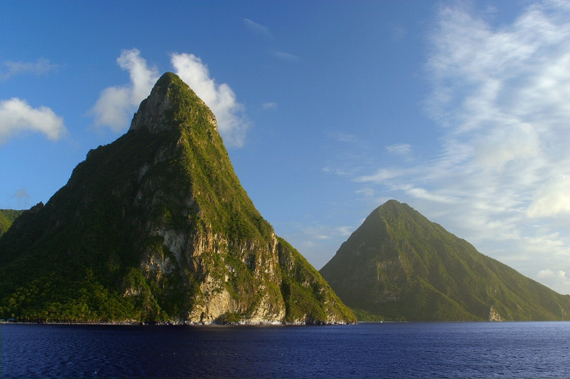 The magnificent twin peaks of the Pitons rise almost half a mile above sea level on St. Lucia in the Caribbean.