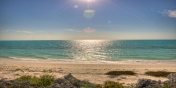 Three Dolphins Villa is right on beautiful Long Bay Beach, Providenciales (Provo), Turks and Caicos Islands.