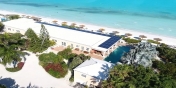A drone photo of the 2 acre Three Dolphins Villa estate in the Turks and Caicos Islands.