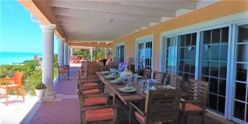 This Caribbean vacation villa has a spacious, shaded terrace for dining, socializing and relaxing.