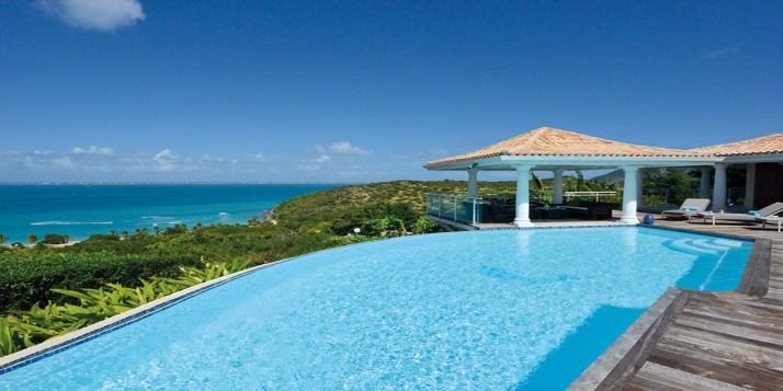 A fabulous, fully air conditioned, 4 bedroom villa with swimming pool and unobstructed views of the Caribbean Sea!