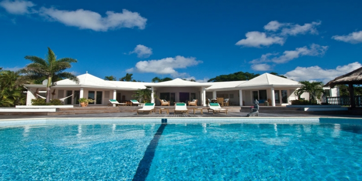 A magnificent, brand new, fully air conditioned villa with 3 bedrooms, swimming pool and views of the Caribbean Sea!