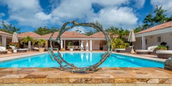 An open and spacious, 4 bedroom villa with swimming pool and breathtaking views of Long Bay and the Caribbean Sea!