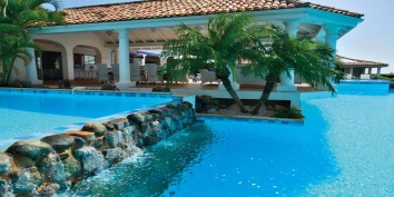 A gorgeous 4 bedroom villa with one of the largest swimming pools on the island and stunning views!