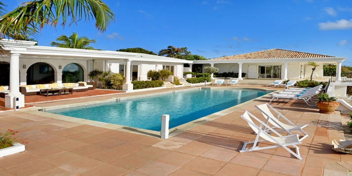 A luxurious and stunning 3 bedroom, oceanview villa with spacious heated swimming pool and spectacular views of the Caribbean Sea!