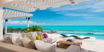 Comfortable, contemporary furnishings for outdoor Caribbean living at this Turks and Caicos vacation villa rental