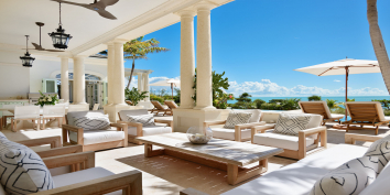 The terrace has very comfortable furnishings at Beach Villa Shambhala, Providenciales.