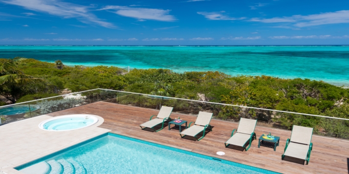 A beautiful 4+ bedroom beachfront villa with freshwater swimming pool and stunning views of Grace Bay Beach!