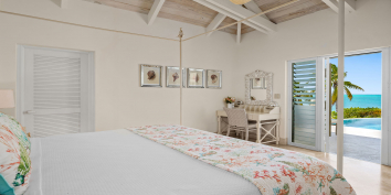 Wake up to the Caribbean breeze in the Seashell bedroom at Turtle Beach Villa, Grace Bay Beach, Providenciales (Provo), Turks and Caicos Islands.