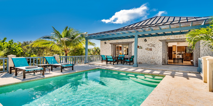 A charming one bedroom cottage with private swimming pool set one lot back from Grace Bay Beach!