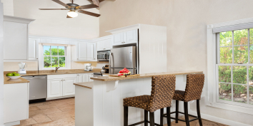 The kitchen of this Turks and Caicos villa rental is equipped with everything you need while on vacation.