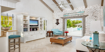 The spacious living room at Nutmeg Cottage, Grace Bay Beach, Providenciales (Provo), Turks and Caicos Islands.
