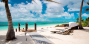 Conch Beach Villa occupies a truly stunning location on Grace Bay Beach, Providenciales (Provo), Turks and Caicos Islands.