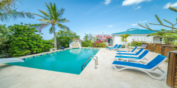 Cool down in your private swimming pool at this Providenciales holiday villa rental in the Turks and Caicos Islands.