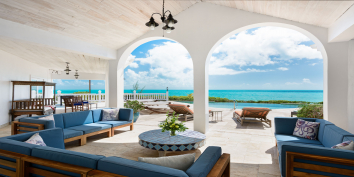 Relax comfortably in the shade and enjoy the stunning views while on vacation in the Turks and Caicos Islands.