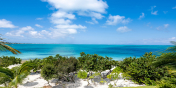 The turquoise sea of Grace Bay is right in front of Water Edge Villa, Grace Bay Beach, Providenciales (Provo), Turks and Caicos Islands.