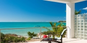 Beautiful views of the turquoise sea from Miami Vice One, Sapodilla Bay Beach, Providenciales, Turks and Caicos Islands.