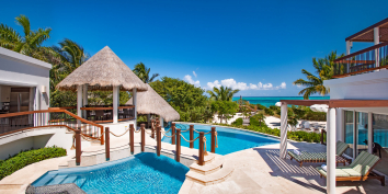 A fully staffed, luxury, 5 or 6 bedroom villa with an extravagant, resort-inspired design on a magnificent beach!