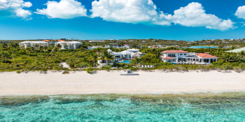 Walk along miles of white sandy beach just in front of your Turks and Caicos beachfront vacation villa.