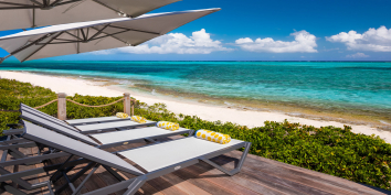 The beachfront deck is a great place for soaking up the Caribbean sun during your vacation.