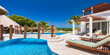 This Caribbean luxury villa rental has a large, beachfront, freshwater swimming pool.
