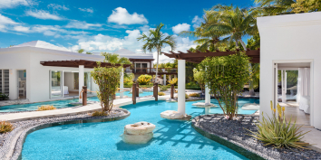 Relax with a good book or soak up the Caribbean atmosphere of this Turks and Caicos luxury villa rental.