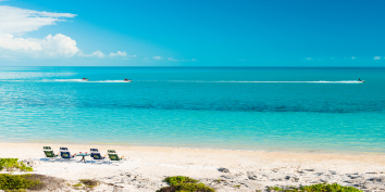 Sandy Beaches is located beachfront on beautiful Long Bay Beach, Providenciales, Turks and Caicos Islands.