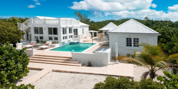 A charming two bedroom, three bathroom beachfront villa with private pool and direct access to the amazing beach of Taylor Bay.