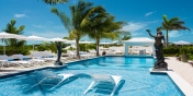 The swimming pool of Impulse Beach Estate, Grace Bay Beach, Turks and Caicos Islands.