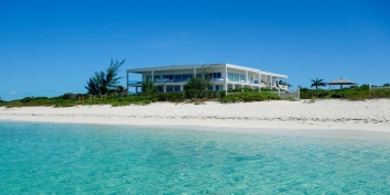 Impulse Beach Estate is located on one of the most beautiful stretches of Grace Bay Beach, Turks and Caicos Islands.