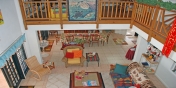 SOL Y MAR VILLA, TOBAGO W.I. Living and dining rooms viewed from the loft above
