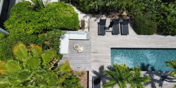 An aerial photo of the swimming pool and deck of Villa Islander, Providenciales (Provo), Turks and Caicos Islands.