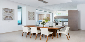 The indoor dining area of this luxury Turks and Caicos villa rental.