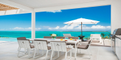 Beach Enclave North Shore Villa 1 has both indoor and outdoor dining areas.