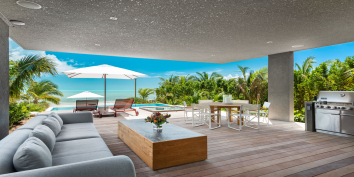 The “outdoor living room” of a Beach Enclave Long Bay Beach House, the perfect place to relax and enjoy.