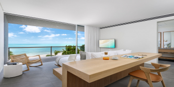 The spacious master bedroom has a private terrace and fantastic views of Long Bay Beach, Turks and Caicos Islands.