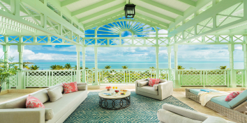 The master bedroom of these Turks and Caicos luxury villa rentals have an expansive terrace with magnificent views.