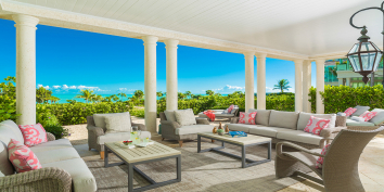 The terrace in front of the great room is a great place to relax uring your vacation at The Villas at The Shore Club, Turk and Caicos Islands.