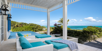 The beachfront covered terrace of Villa Azzurra, Grace Bay Beach, Providenciales, Turks and Caicos Islands.