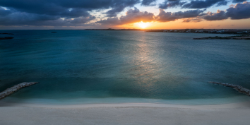 You have a good chance of seeing beautiful sunsets at villa Emerald Bay, Providenciales, Turks and Caicos Islands.