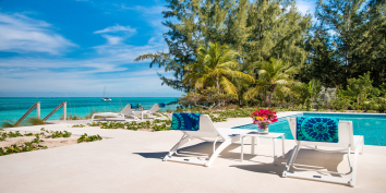 Soak up the Caribbean sunshine while on vacation at Grace Too, Grace Bay Beach, Providenciales (Provo), Turks and Caicos Islands.