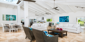 This Turks and Caicos villa rental has a great room with high, vaulted ceilings.